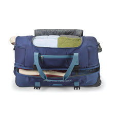 Load image into Gallery viewer, Open top and bottom compartments of packed navy High Sierra wheeled duffel.
