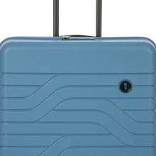 Load image into Gallery viewer, Close up to the front top-half of the suitcase. Set on a white background.
