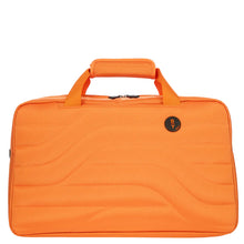 Load image into Gallery viewer, Front view of the orange duffle bag on a white background. A small B|Y Bric&#39;s black logo is seen on the top right. 

