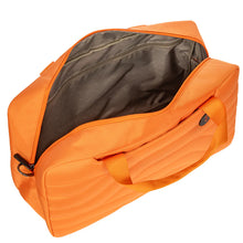 Load image into Gallery viewer, Angled-top view of the duffle with the main compartment opened. the lining on the inside is a light brown. Set on a white background.
