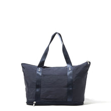 Load image into Gallery viewer, Back view of the navy bag on a white background. 
