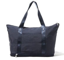 Load image into Gallery viewer, Back view of the navy bag. Set on a white background.
