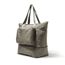 Load image into Gallery viewer, Angled view of the expanded sterling tote bag. Set on a white background.
