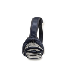 Load image into Gallery viewer, Top view of the navy bag with the zipper compartments opened. 
