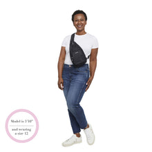 Load image into Gallery viewer, View of a 5 foot, 10 inches tall model wearing the sling bag on the front. 
