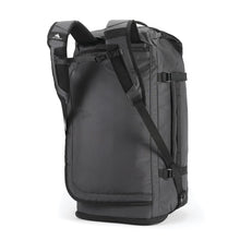 Load image into Gallery viewer, Angled back view of the black duffle backpack with the shoulder straps pulled up.
