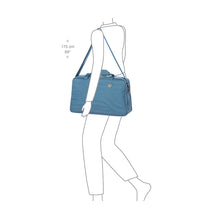 Load image into Gallery viewer, A drawn 175 centimeters tall model using the bag with the shoulder strap on a white background. 
