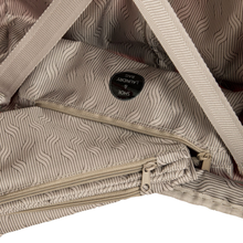 Load image into Gallery viewer, Close up to the show and laundry bag compartment inside the suitcase. 
