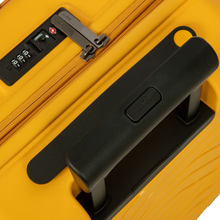 Load image into Gallery viewer, Close up to the top of the suitcase. The three-digit lock code is at the center. 
