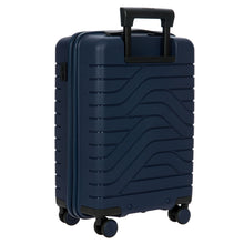 Load image into Gallery viewer, Angled back view of the suitcase on a white background. The telescopic handle is partly pulled up.
