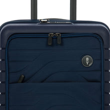 Load image into Gallery viewer, Close up to the top front of the suitcase on a white background. The front features a small Bric&#39;s logo at the right.
