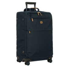 Load image into Gallery viewer, Angled front view of the suitcase on a white background. 
