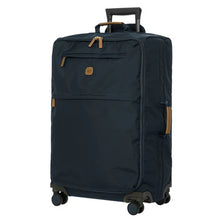 Load image into Gallery viewer, Angled front view of the suitcase on a white background. 
