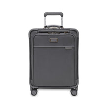 Load image into Gallery viewer, Front view of the suitcase with the telescopic handle partly pulled up.
