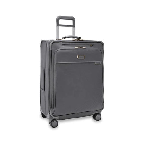 Angled front view of the suitcase with the telescopic handle partly pulled up.
