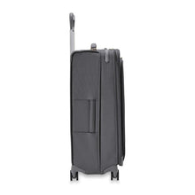 Load image into Gallery viewer, Side view of the suitcase with the telescopic handle partly pulled up.
