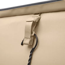 Load image into Gallery viewer, Close up to the front lid&#39;s adjustable strap which can be used to hold a hanger with a suit.
