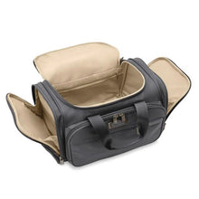 Load image into Gallery viewer, Angled top view of the steel gray underseat duffle bag. The main and side compartments are shown open. The inside lining fabric is light brown.
