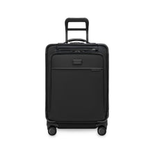 Load image into Gallery viewer, Front panel view of the black suitcase with the telescopic handle partly extended.
