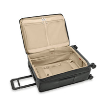 Load image into Gallery viewer, Open black suitcase with beige interior on a white background.

