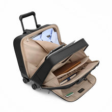 Load image into Gallery viewer, Angled view of the spinner brief with all the main compartments shown opened and filled with accessories. 
