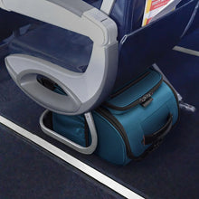 Load image into Gallery viewer, The ocean blue underseat bag placed under the seat.
