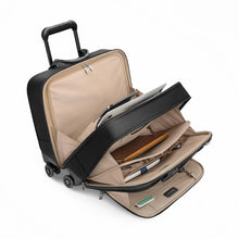 Load image into Gallery viewer, 
Angled view of the spinner brief with the three divided compartments for organization unzipped. 



