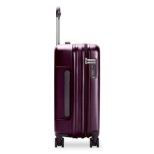 Load image into Gallery viewer, Side Panel view of the plum colored hard shell suitcase, showing a TSA 3-dial combination lock closure.


