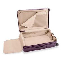 Load image into Gallery viewer, Interior view of the plum suitcase. The interior lining is light a light brown. The front panel side features a zipper-closing compartment. 
