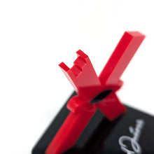 Load image into Gallery viewer, Close up to the top of the red Letter X figure.
