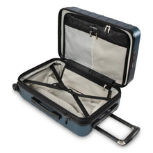 Load image into Gallery viewer, Interior view of the suitcase, featuring a zipper-closing panel divider, and adjustable straps. 
