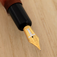 Load image into Gallery viewer, Close up of the orange red tamenuri pen nib
