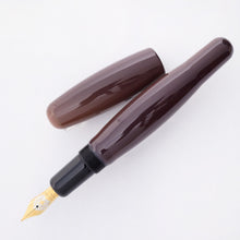 Load image into Gallery viewer, Uncapped view of the purple Tamenuri fountain pen.
