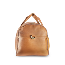Load image into Gallery viewer, Side panel view of the tan leather duffle bag. It features a double-zipper pocket. 
