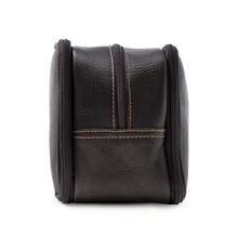 Load image into Gallery viewer, Side view of the brown leather shaving kit bag. 
