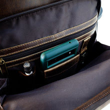 Load image into Gallery viewer, The front compartment features a holder for a pen or pencil, a phone, and a key holder.
