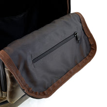 Load image into Gallery viewer, The first main compartment&#39;s flap features a zipper-closed area for smaller items.
