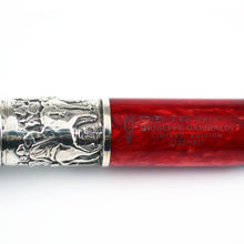 Load image into Gallery viewer, Close up to the silver band with engraved horses and the barrel with engraved Delta logo and text.
