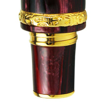 Load image into Gallery viewer, Close up to the bottom of the fountain pen golden ring. It has engraved decorations and two hallmarks. 
