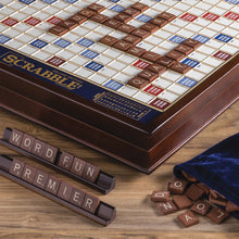 Load image into Gallery viewer, Close up to the Scrabble wooden board with letter tiles and tile holders.
