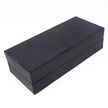 Load image into Gallery viewer, Angled view of the black outer box.
