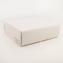 Load image into Gallery viewer, White cardboard box on a white background.
