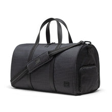 Load image into Gallery viewer, Front angled view of the duffle bag
