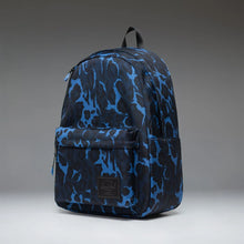 Load image into Gallery viewer, Angled front panel view of the blue toned Cheetah Camo Pattern backpack.
