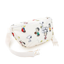 Load image into Gallery viewer, Angled front view of the Snoopy pattern hip pack with the adjustable straps detached and set to the sides.
