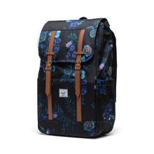 Load image into Gallery viewer, A black backpack with an evening floral pattern on the fabric, featuring brown straps and a brand label on the front.

