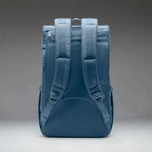 Load image into Gallery viewer, Back panel view of the blue diamond-pattern backpack. It has a padded back, padded shoulder straps, and two zippers for access to the laptop compartment.

