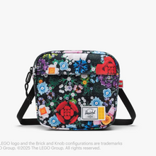 Load image into Gallery viewer, Front view of the Lego crossbody bag with floral brick pattern 
