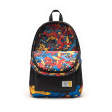Load image into Gallery viewer, Interior view of the black backpack. The fabric lining is a print of colorful Lego bricks. 
