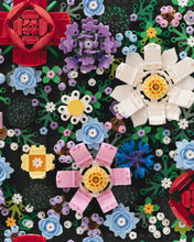 Load image into Gallery viewer, Colorful flower pattern made of Lego blocks.
